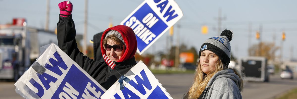 United Auto Workers union members picket at the General Motors plant in Flint, Michigan on October 23, 2019.