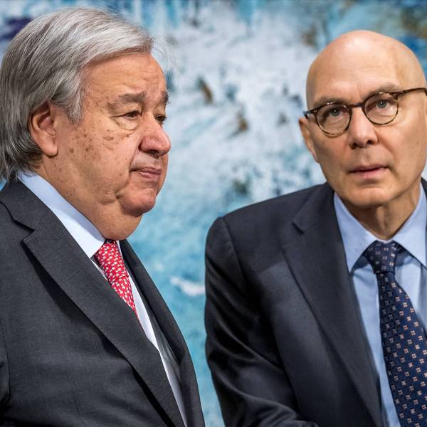 United Nations Secretary-General António Guterres (L) stands next to UN High Commissioner for Human Rights Volker Türk
