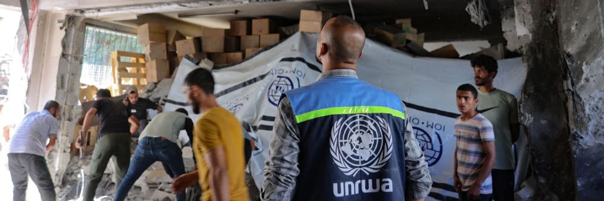 unwra worker and displaced palestinians