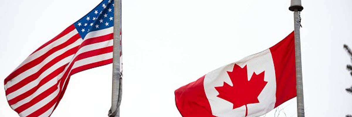 US and Canadian flags