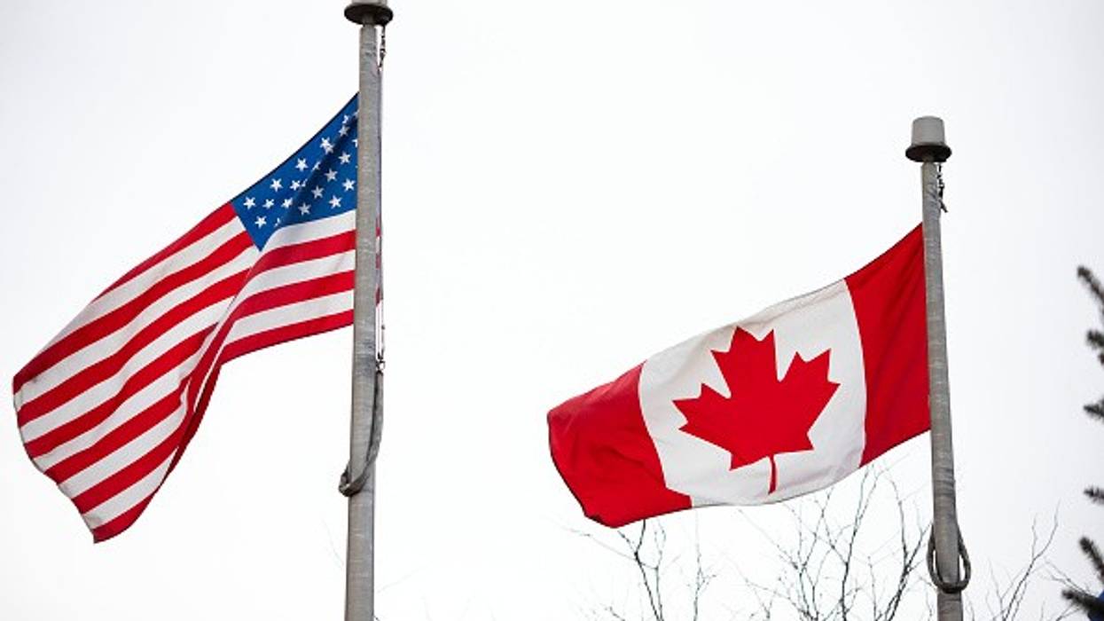 US and Canadian flags