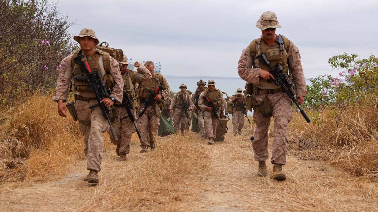 US and Ecuadorian troops march together