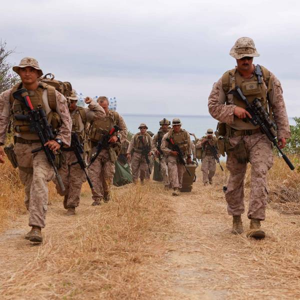 US and Ecuadorian troops march together