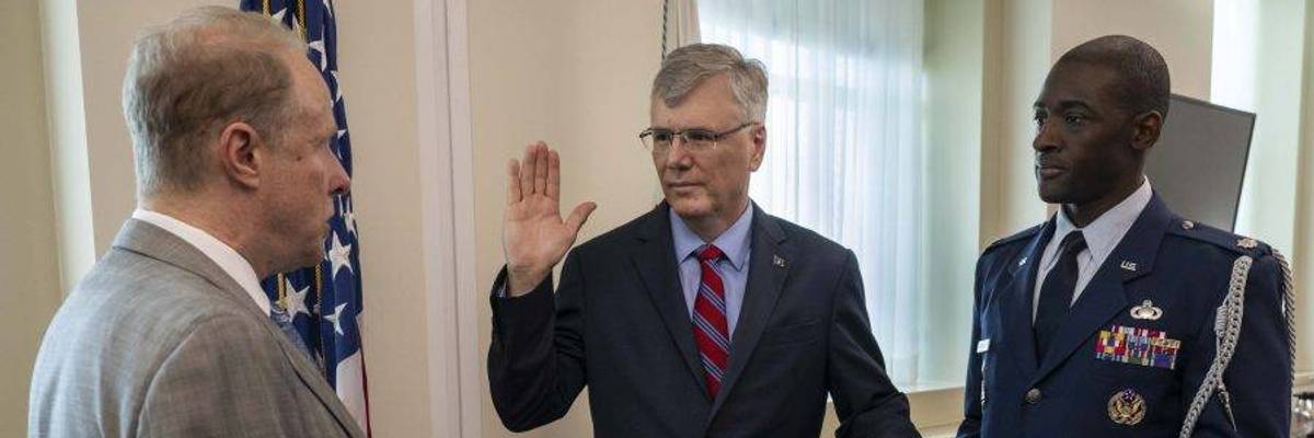 US Deputy Secretary of Defense Steve Feinberg administers the oath of office to Air Force Secretary Troy Meink