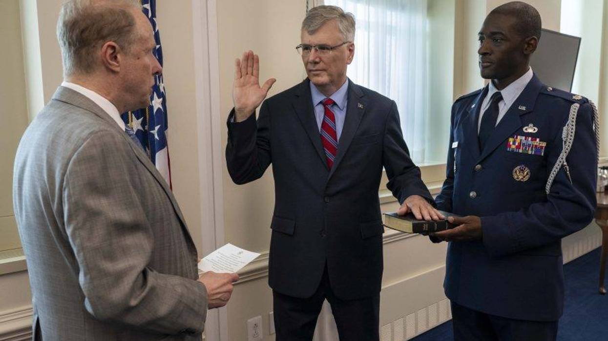 US Deputy Secretary of Defense Steve Feinberg administers the oath of office to Air Force Secretary Troy Meink
