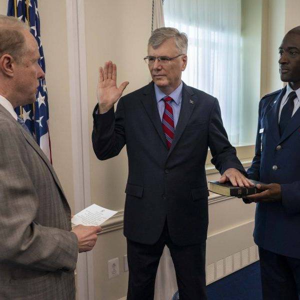 US Deputy Secretary of Defense Steve Feinberg administers the oath of office to Air Force Secretary Troy Meink