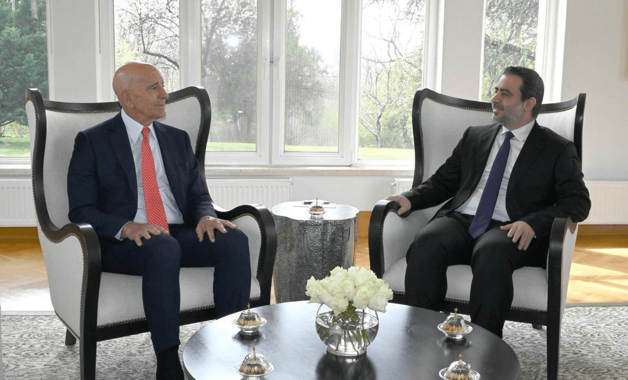 US envoy to Syria Tom Barrack speaks with Syrian Foreign Minister Asaad al-Shaibani.