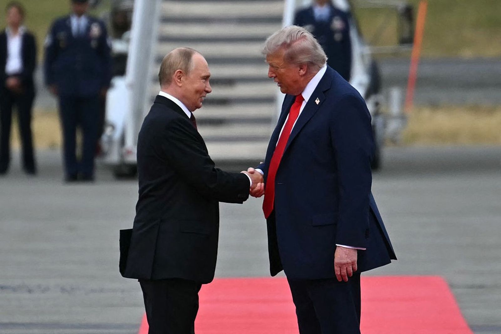 us-president-donald-trump-greets-russian-president-vladimir-putin-on-the-tarmac-in-anchorage-alaska-on-august-15-2025.jpg?id=61472100&width=1024&height=682&coordinates=0%2C0%2C0%2C0