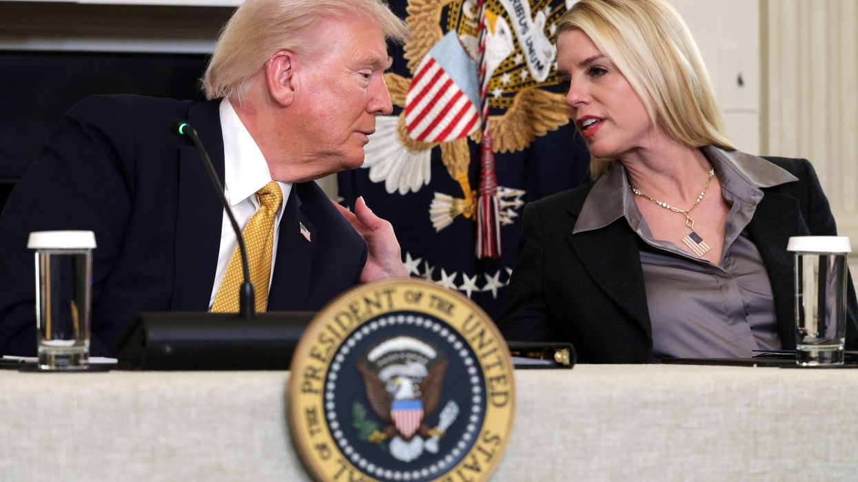 US President Donald Trump speaks with Attorney General Pam Bondi