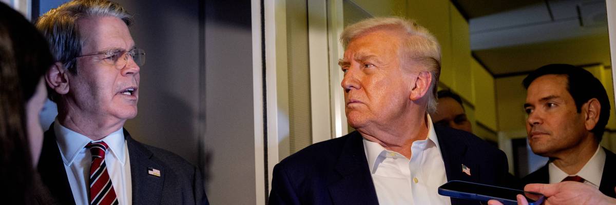US Treasury Secretary Scott Bessent, accompanied by President Donald Trump
