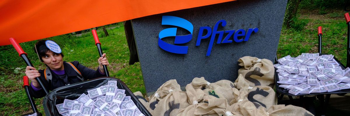 Vaccine equity campaigners protest at Pfizer headquarters in the United Kingdom