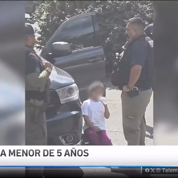 Video footage shows agents holding a 5-year-old girl while attempting to pressure her immigrant father to leave their home on September 16, 2025.