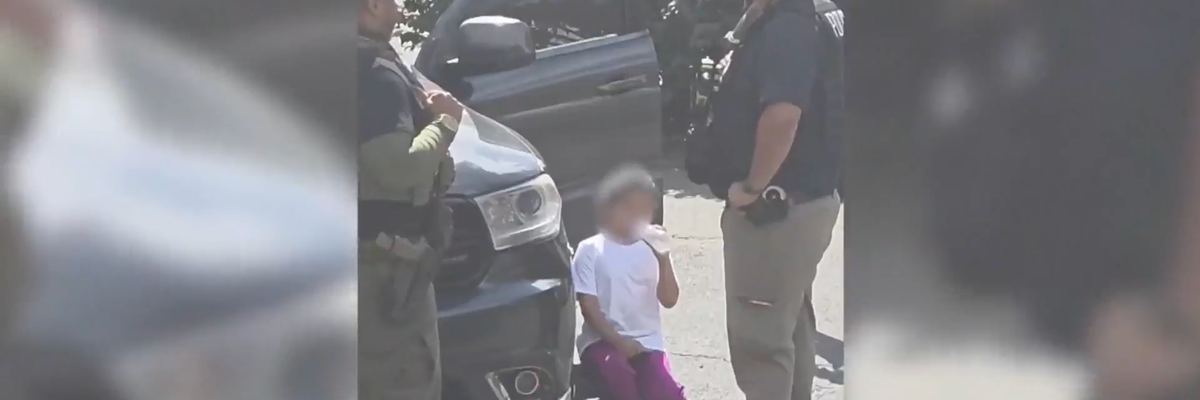 Video footage shows agents holding a 5-year-old girl while attempting to pressure her immigrant father to leave their home