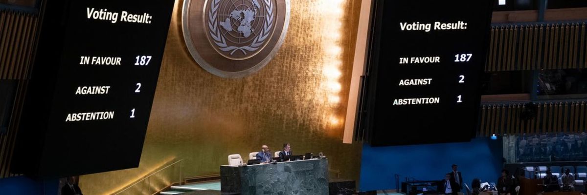 Video screens show the results of the 187-2 UN vote against the US embargo on Cuba.