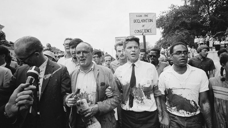Vietnam Protesters Splashed in Red Paint