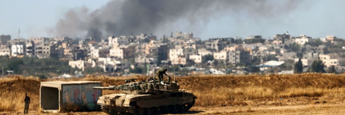 View of Gaza from southern Israel showing smoke rising from an Israeli attack