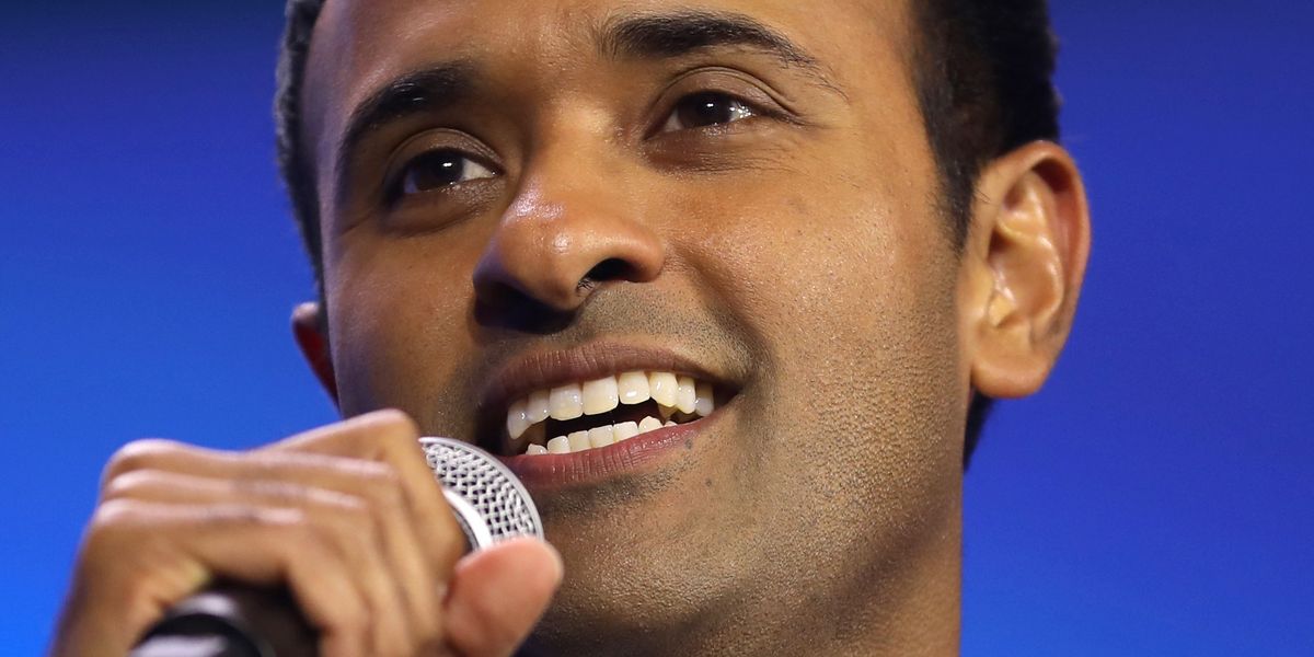 Vivek Ramaswamy speaking into a microphone.