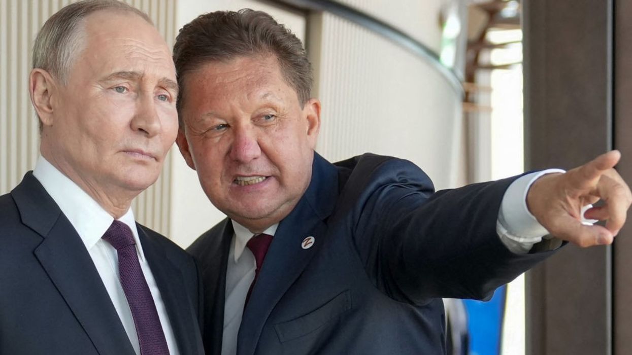Vladimir Putin and Gazprom CEO Alexei Miller