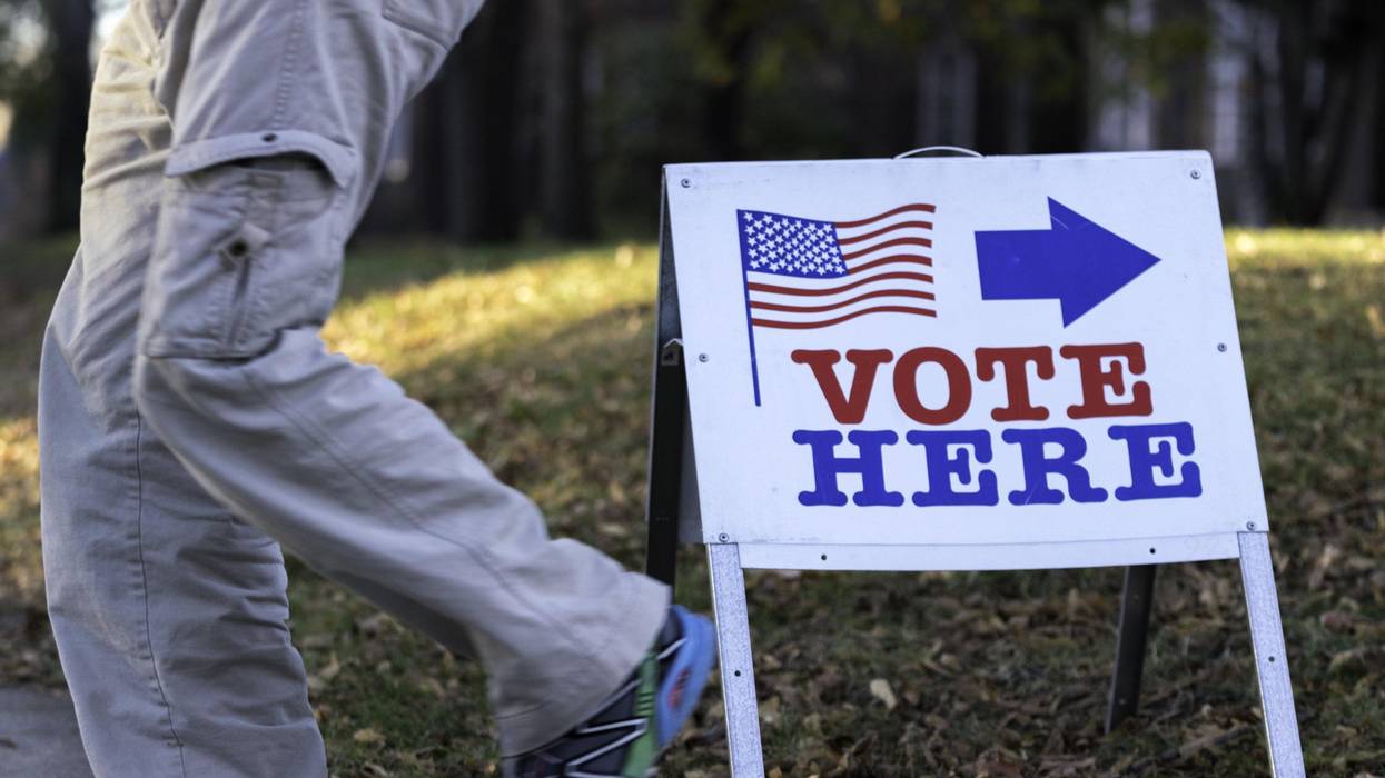 Vote here sign