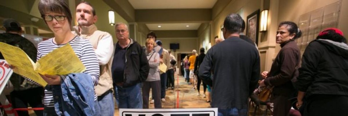 Calls Grow to Delay In-Person Primary Voting and Move to Mail-In Ballots as Coronavirus Sweeps Across US