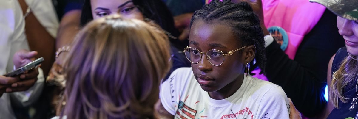 VP Harris and young girl.