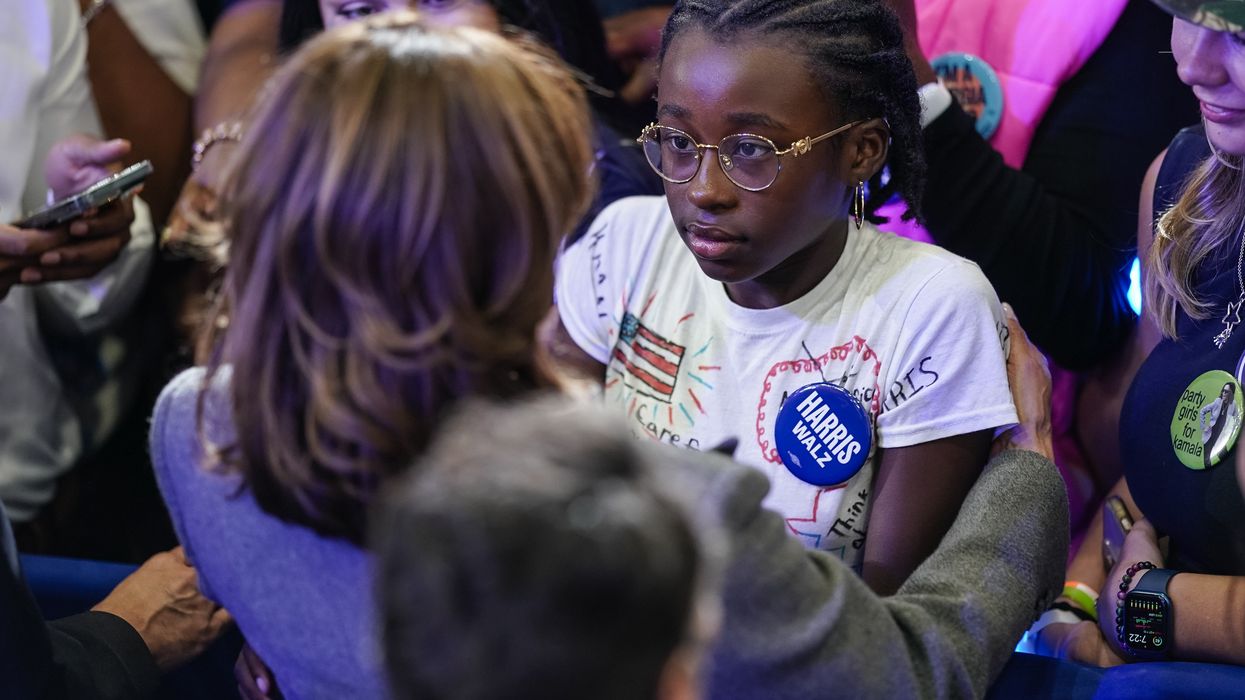 VP Harris and young girl.
