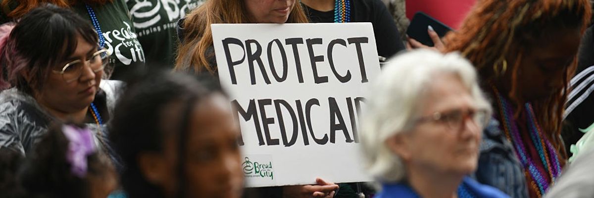 WASHINGTON, D.C., MAY 22: People protest the upcoming Medicaid