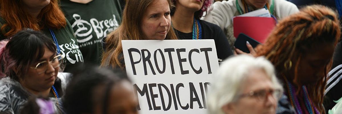 WASHINGTON, D.C., MAY 22: People protest the upcoming Medicaid