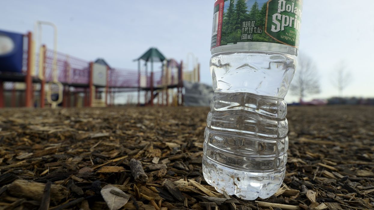 Water bottle shown near PFAS-contaminated area.