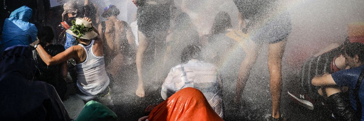 Water cannon used against climate protesters in The Hague