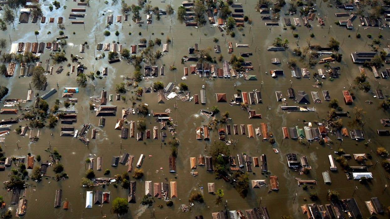 Water from Katrina surrounds homes in Ninth Ward of New Orleans.