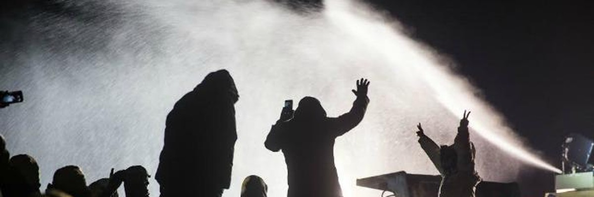 Police Blast #NoDAPL Activists With Water Cannons in Sub-Freezing Temps