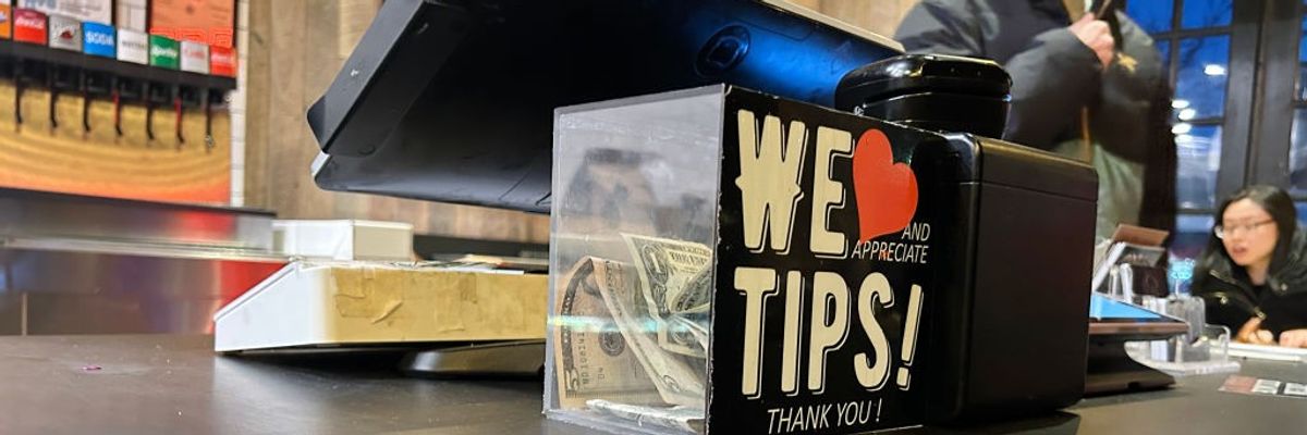 We appreciate Tips, Thank you, tips jar in Mighty Quinns BBQ restaurant, Queens, New York