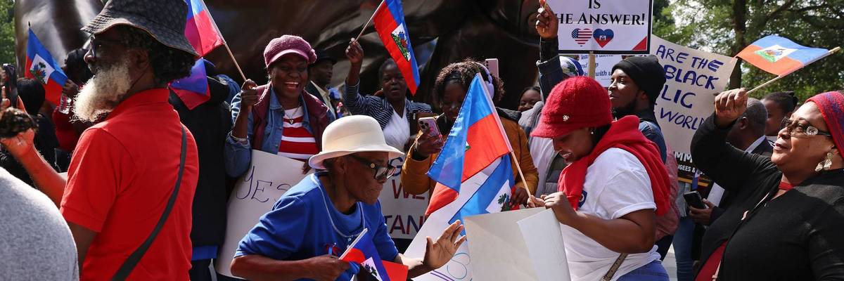 'We defeat hate together.' Haitians, others rally in Boston after Trump, Vance target Haitians in Springfield, Ohio.