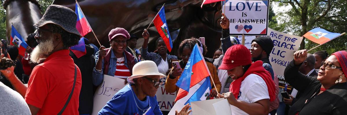 'We defeat hate together.' Haitians, others rally in Boston after Trump, Vance target Haitians in Springfield, Ohio.