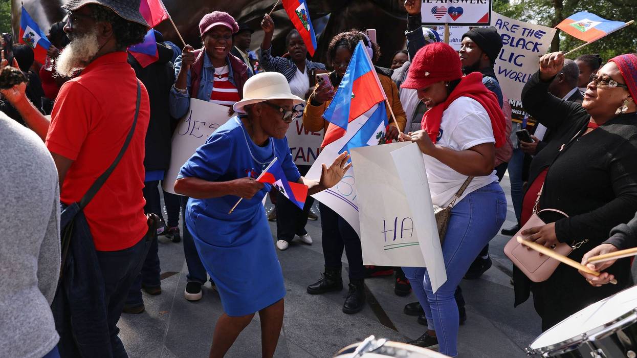 'We defeat hate together.' Haitians, others rally in Boston after Trump, Vance target Haitians in Springfield, Ohio.