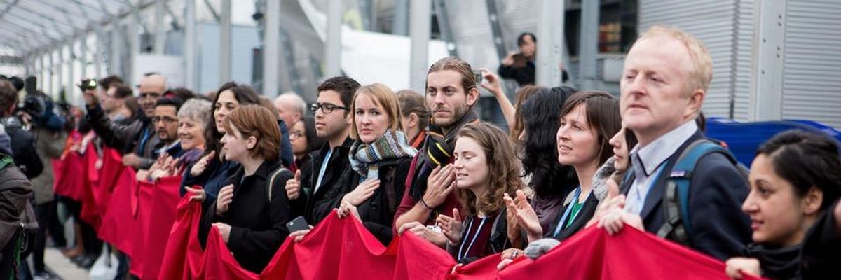 Decrying Draft Deal that 'Fails Humanity,' COP21 Protesters Draw Red Line