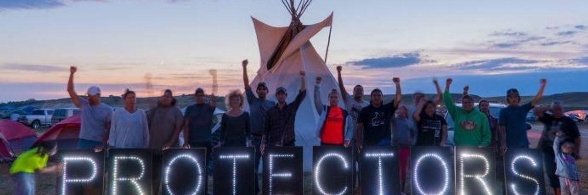 As Dakota Access Pipeline Fight Grows, Where Are Obama and Clinton?