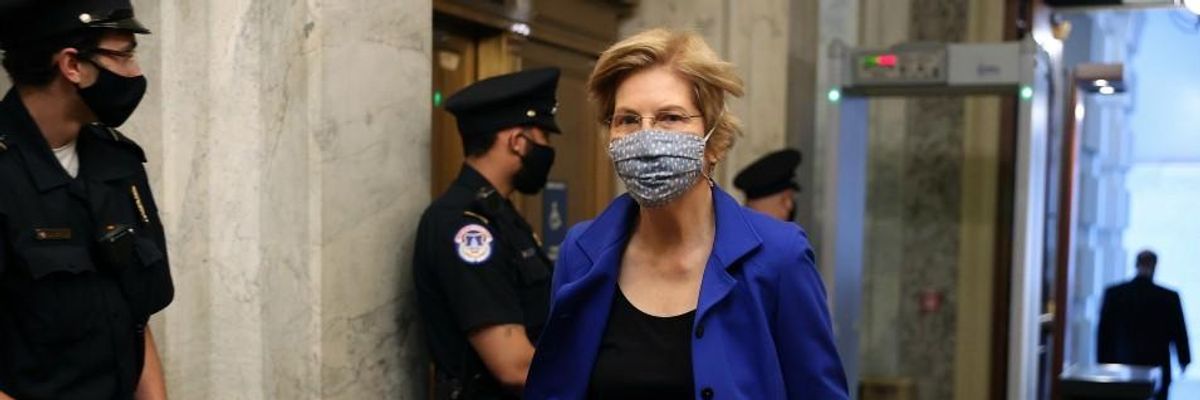Warren Urges CDC Director to Push Mask Mandates as Covid-19 Cases and Deaths Surge Across the US