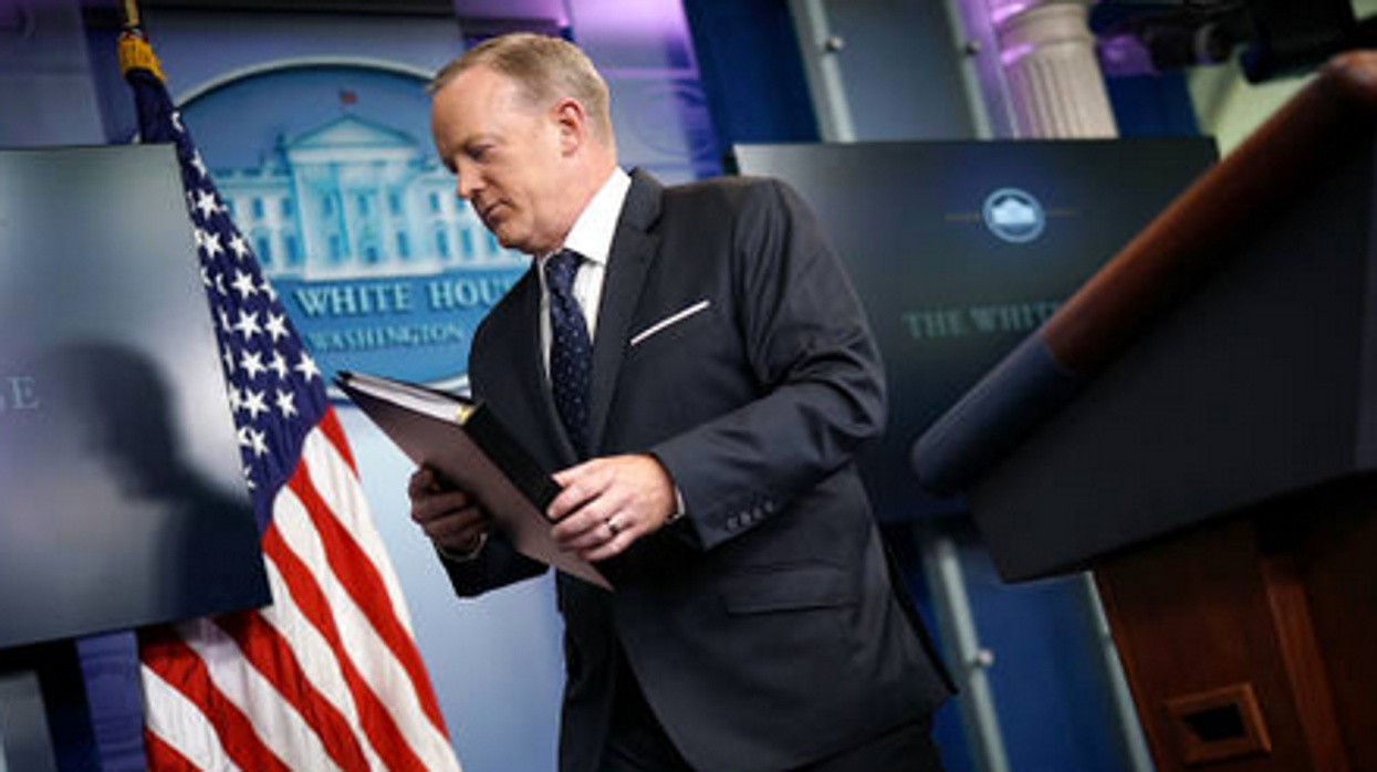 Don't Ask About Sean Spicer's Notebooks or He'll Call "Proper Authorities" On You