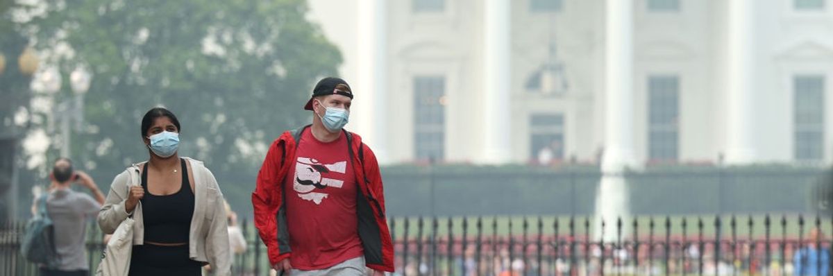 White House through wildfire smoke.