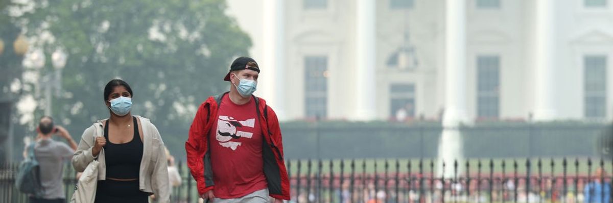 White House through wildfire smoke. 