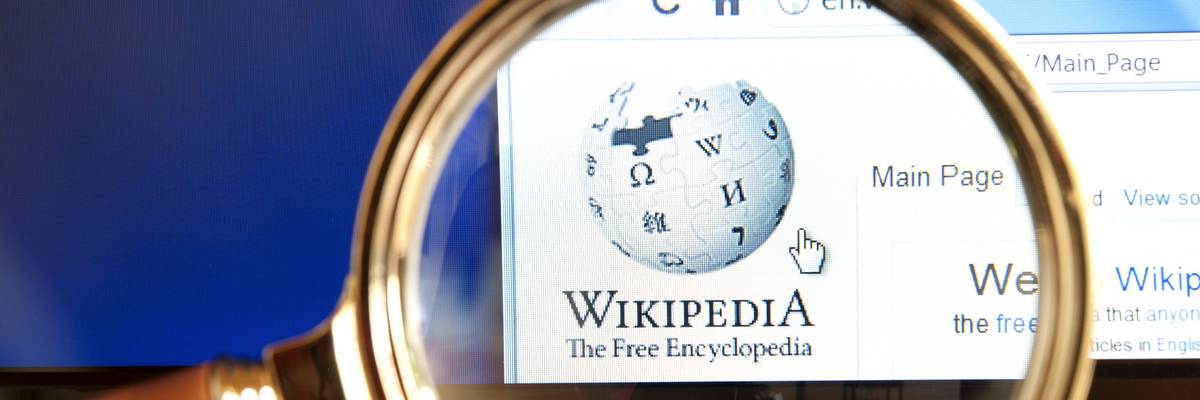 Wikipedia website through a magnifying glass