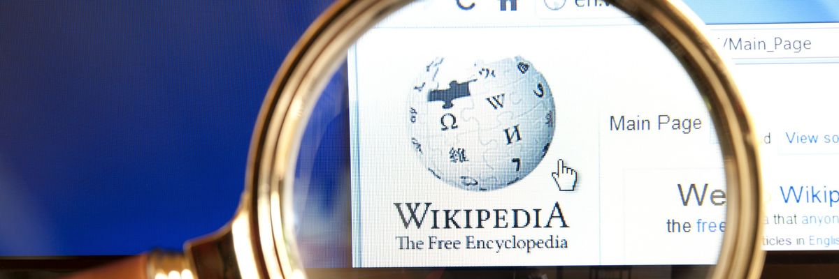 Wikipedia website through a magnifying glass