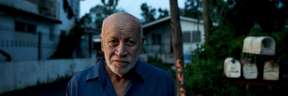Wilson Aponte poses in front of his home on September 20, 2022 in Cabo Rojo, Puerto Rico.