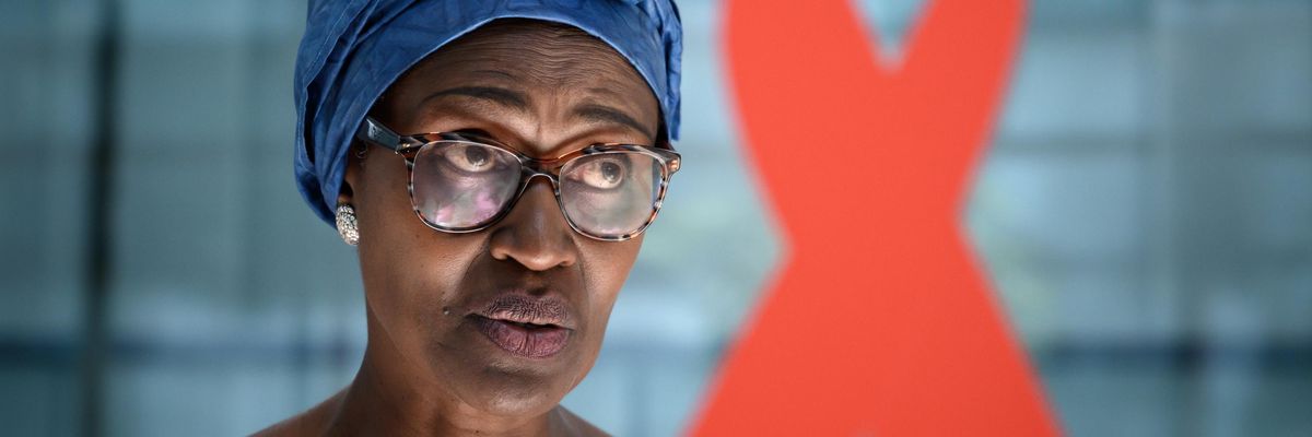 Winnie Byanyima speaks to the press