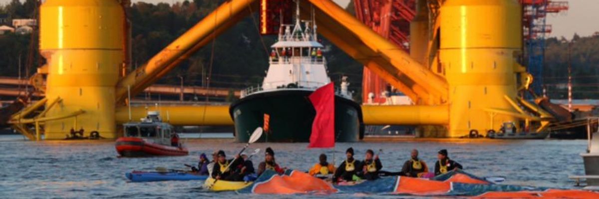 As Shell Drilling Rig Aims for Arctic, Waves of Kayaks Block the Way