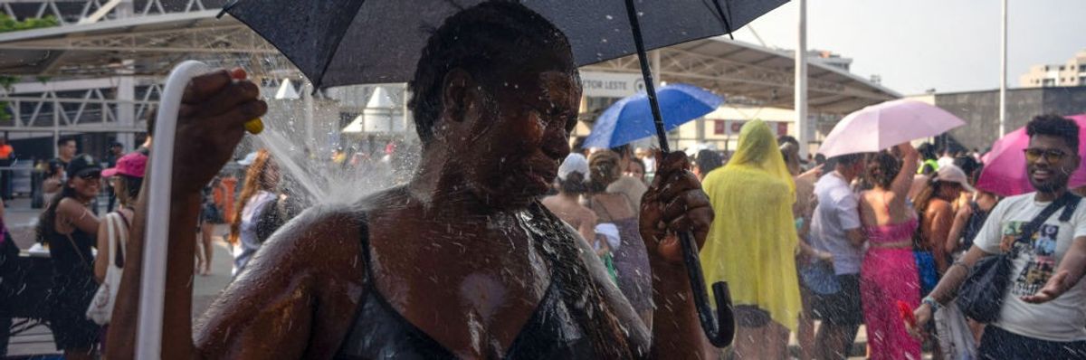 Woman in Brazil tries to cool off during heatwave