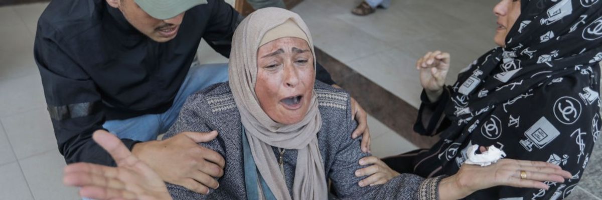 Woman in Gaza cries out amid Israeli assault
