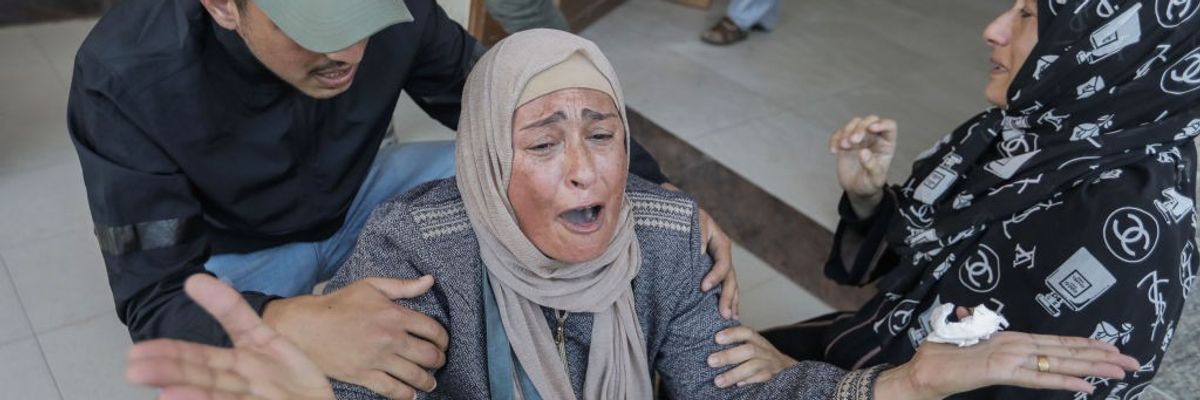 Woman in Gaza cries out amid Israeli assault